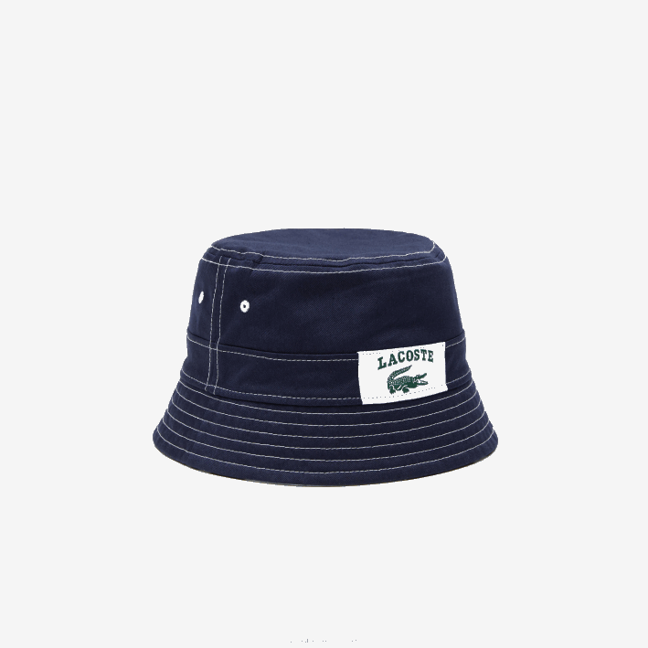 hombres Lacoste 6F242342 azul marino blanco 525 sombrero de pescador heritage de algodón liso o estampado reversible