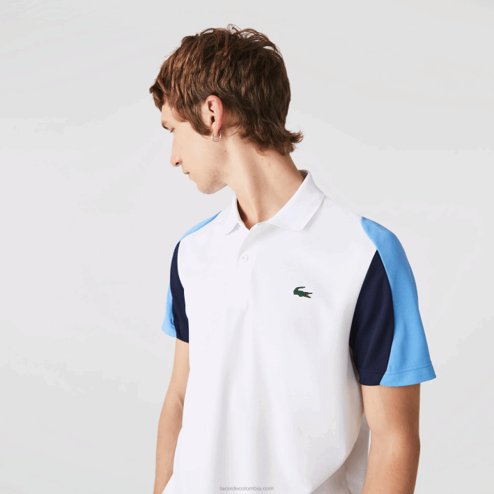hombres Lacoste 6F24556 blanco azul marino 5yp Polo deportivo de tenis de piqué resistente a las carreras de ajuste regular