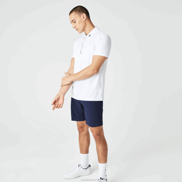 hombres Lacoste 6F24595 blanco azul marino 522 polo de golf de punto deportivo