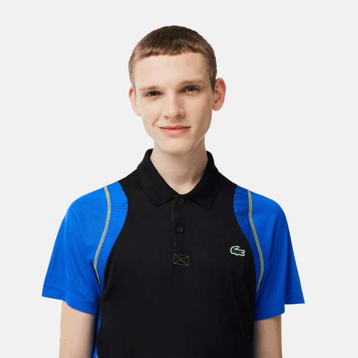 hombres Lacoste 6F2485 xis negro azul amarillo polo de tenis de poliéster reciclado