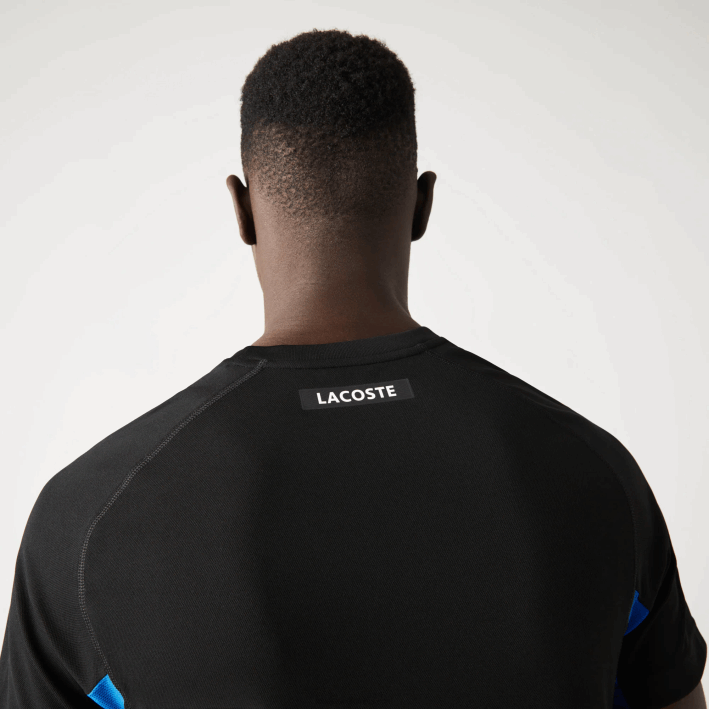 hombres Lacoste 6F24585 azul negro y2e playera de tenis sport color-block ultra-dry piqué