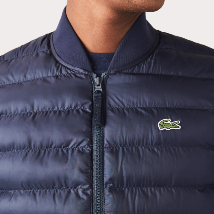 hombres Lacoste 6F241253 fondo azul marino chaleco acolchado repelente al agua