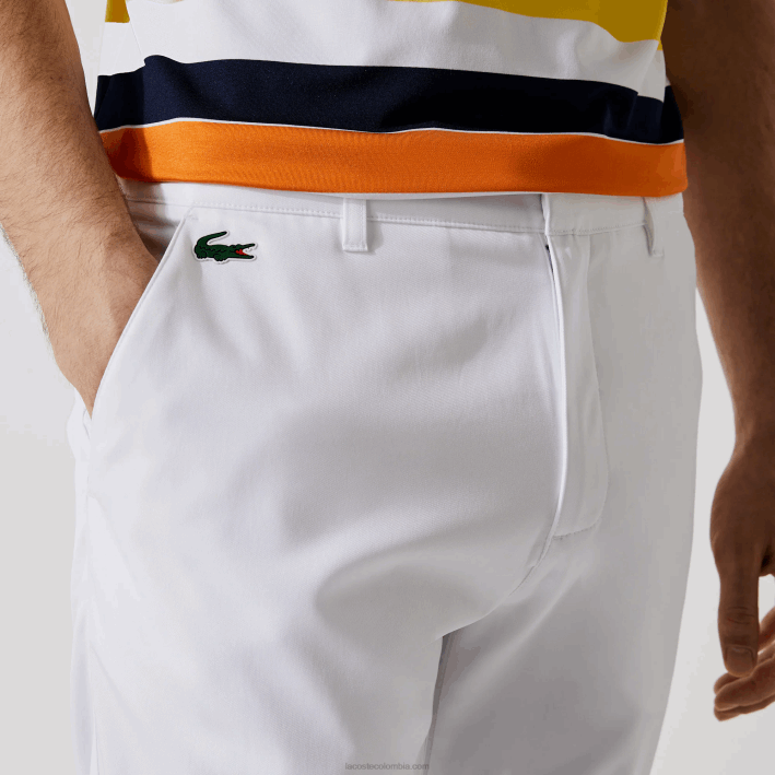 hombres Lacoste 6F241641 blanco 001 pantalones chinos deportivos elásticos de golf