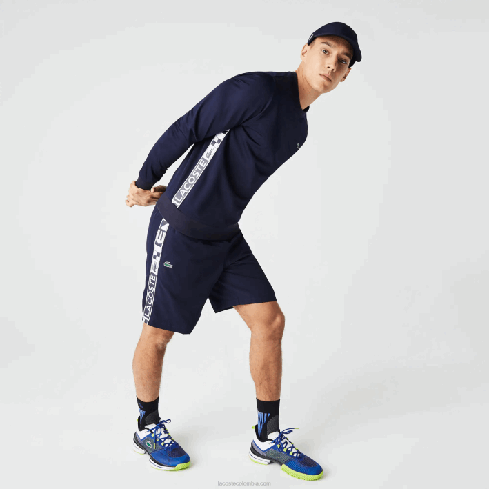 hombres Lacoste 6F241334 azul marino 166 pantalones cortos deportivos de tenis de tafetán hombres Lacoste 6F241334 azul marino 166 pantalones cortos deportivos de tenis de tafetán