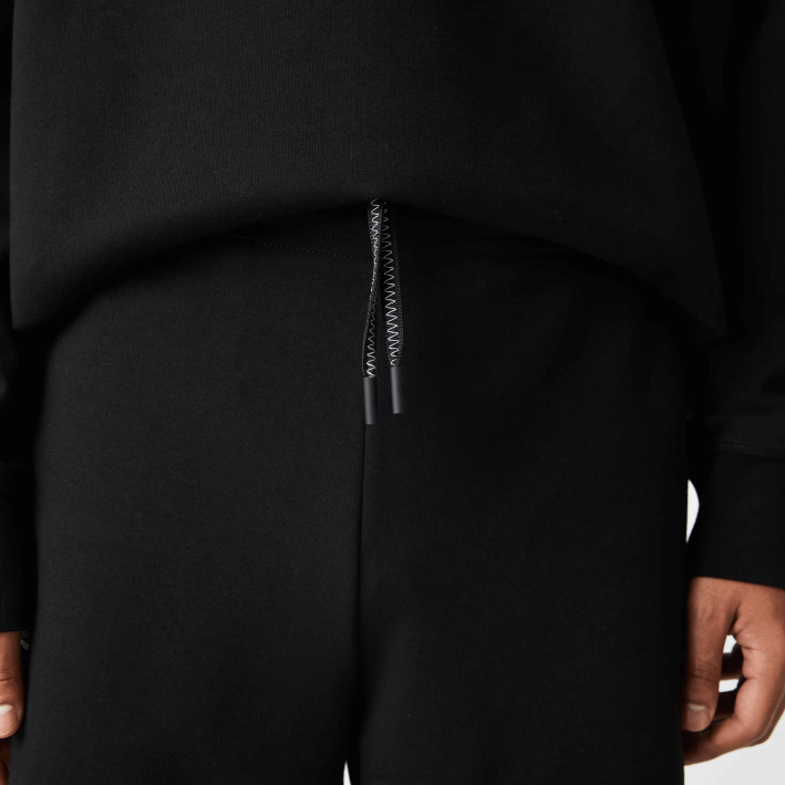 hombres Lacoste 6F241354 negro 031 shorts con estampado reflectante