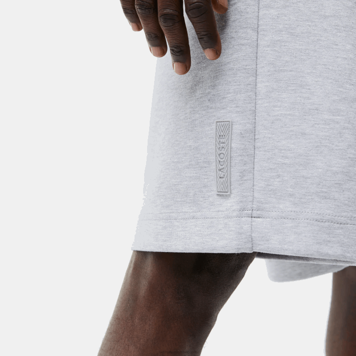 hombres Lacoste 6F241355 lomo gris cca shorts con estampado reflectante