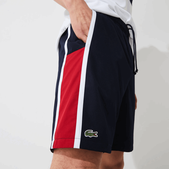 hombres Lacoste 6F241367 azul marino rojo blanco mwp shorts deportivos ligeros con paneles colorblock