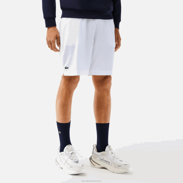 hombres Lacoste 6F241409 blanco azul marino 522 pantalones cortos deportivos ultraligeros