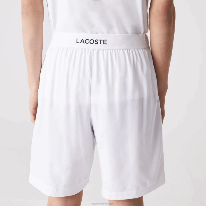 hombres Lacoste 6F241409 blanco azul marino 522 pantalones cortos deportivos ultraligeros