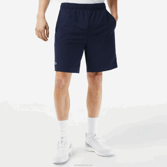 hombres Lacoste 6F241411 azul marino blanco 525 pantalones cortos deportivos ultraligeros
