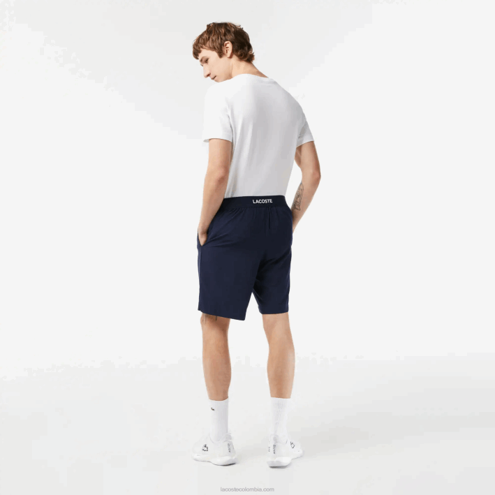 hombres Lacoste 6F241411 azul marino blanco 525 pantalones cortos deportivos ultraligeros