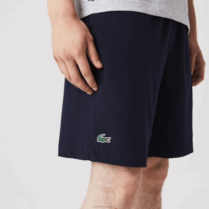 hombres Lacoste 6F241411 azul marino blanco 525 pantalones cortos deportivos ultraligeros