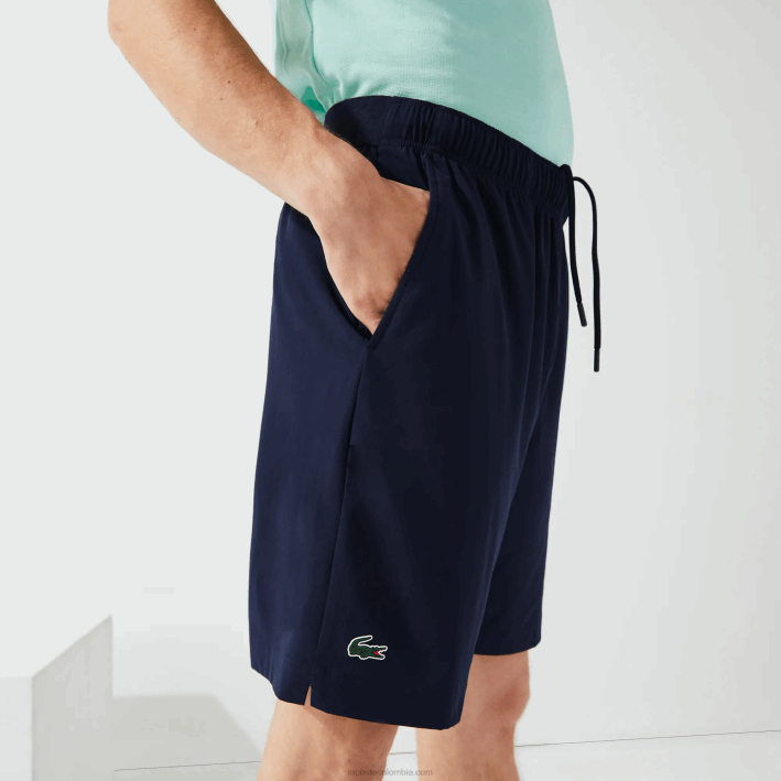 hombres Lacoste 6F241411 azul marino blanco 525 pantalones cortos deportivos ultraligeros