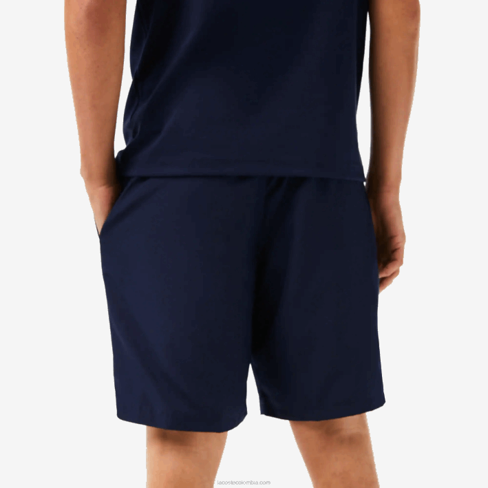 hombres Lacoste 6F241441 azul marino 166 Shorts deportivos de tenis con tejido de diamante sólido