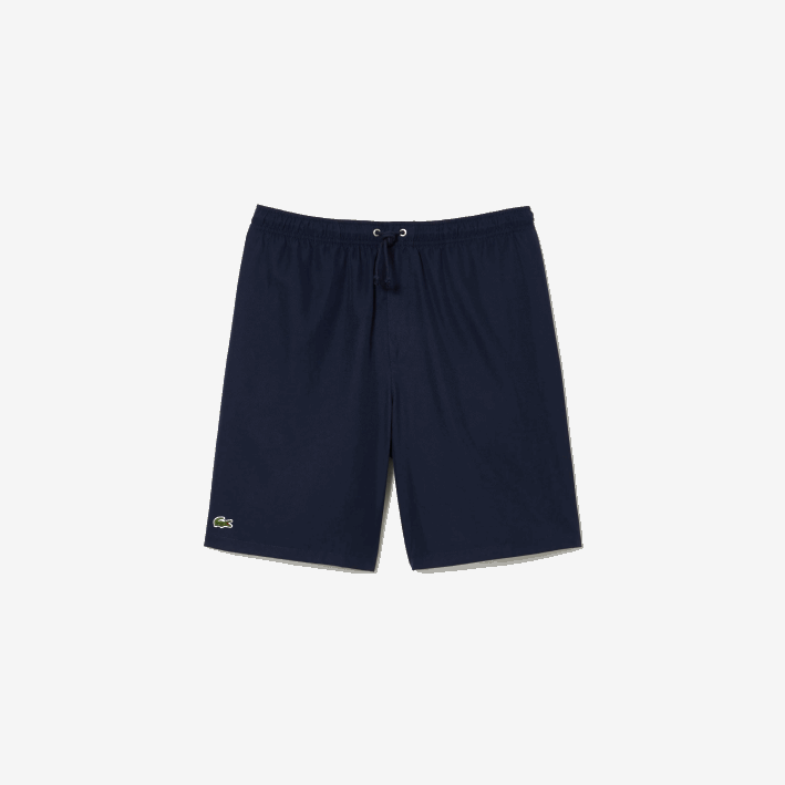 hombres Lacoste 6F241441 azul marino 166 Shorts deportivos de tenis con tejido de diamante sólido
