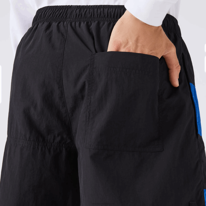 hombres Lacoste 6F241500 negro azul blanco se1 shorts con efecto patchwork y bloques de color