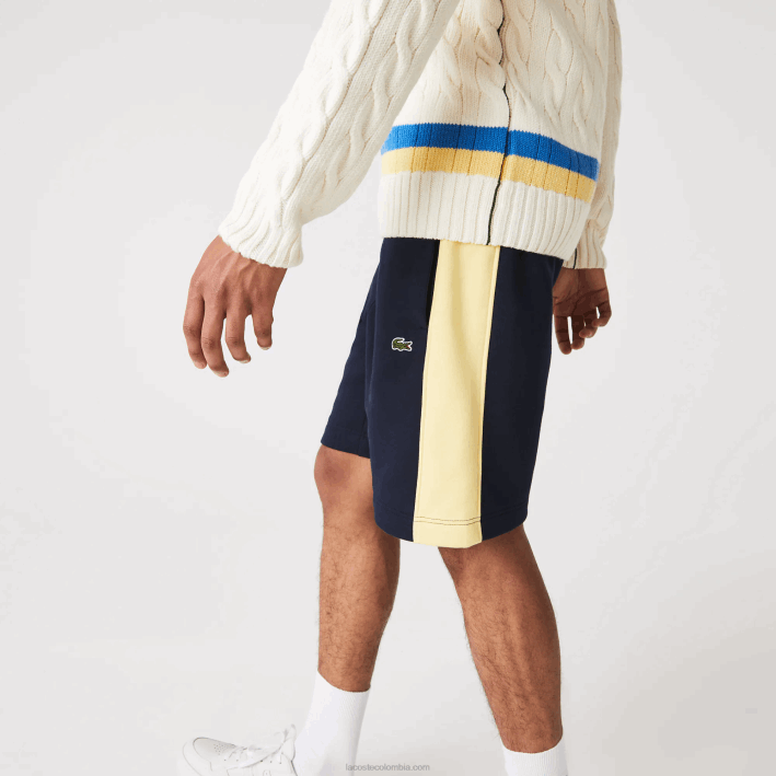 hombres Lacoste 6F241516 azul marino amarillo 144 shorts de felpa cepillada con bloques de color