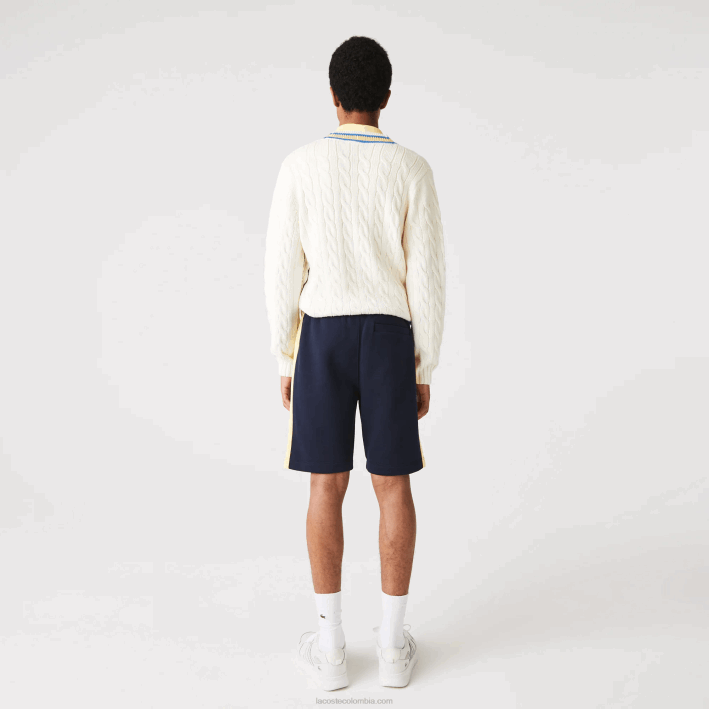 hombres Lacoste 6F241516 azul marino amarillo 144 shorts de felpa cepillada con bloques de color