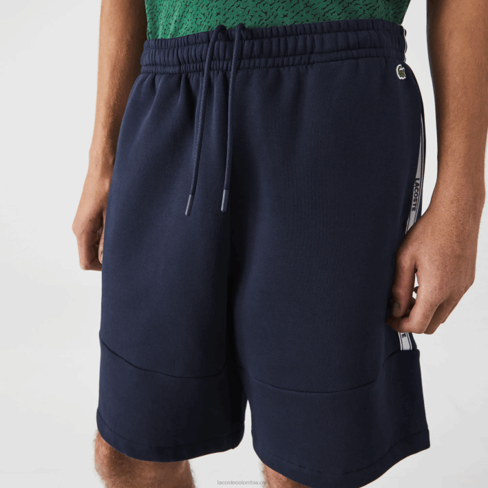 hombres Lacoste 6F241538 azul marino 166 shorts de mezcla de vellón con bandas de la marca