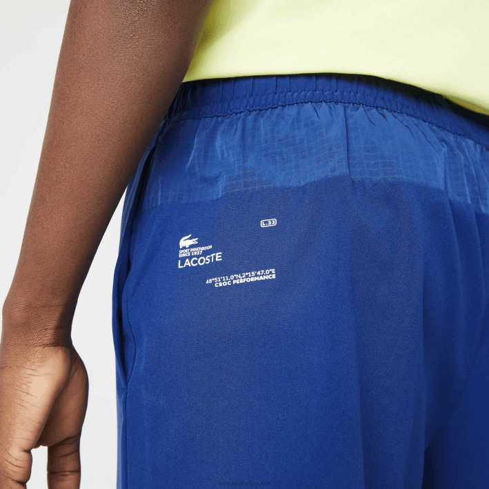 hombres Lacoste 6F241544 azul llamativo amarillo blanco 8q6 shorts deportivos a capas