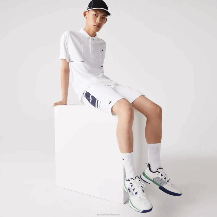 hombres Lacoste 6F241596 blanco azul marino 522 shorts deportivos con bandas laterales estampadas hombres Lacoste 6F241596 blanco azul marino 522 shorts deportivos con bandas laterales estampadas