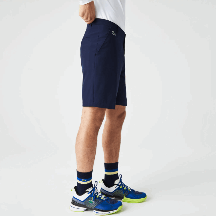 hombres Lacoste 6F24443 azul marino 166 shorts deportivos de golf ligeros y elásticos