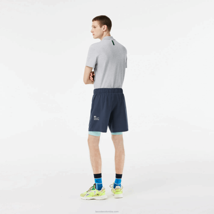 hombres Lacoste 6F24480 azul verde claro b00 pantalones cortos deportivos de dos tonos con calzoncillos incorporados