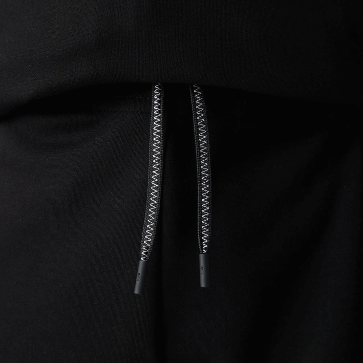 hombres Lacoste 6F241043 negro 031 pantalones de chándal con estampado reflectante