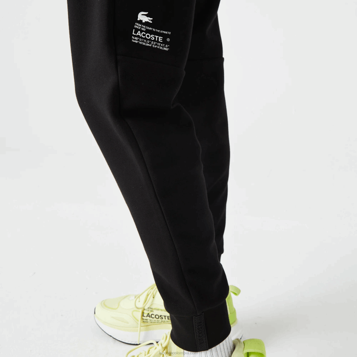 hombres Lacoste 6F241043 negro 031 pantalones de chándal con estampado reflectante