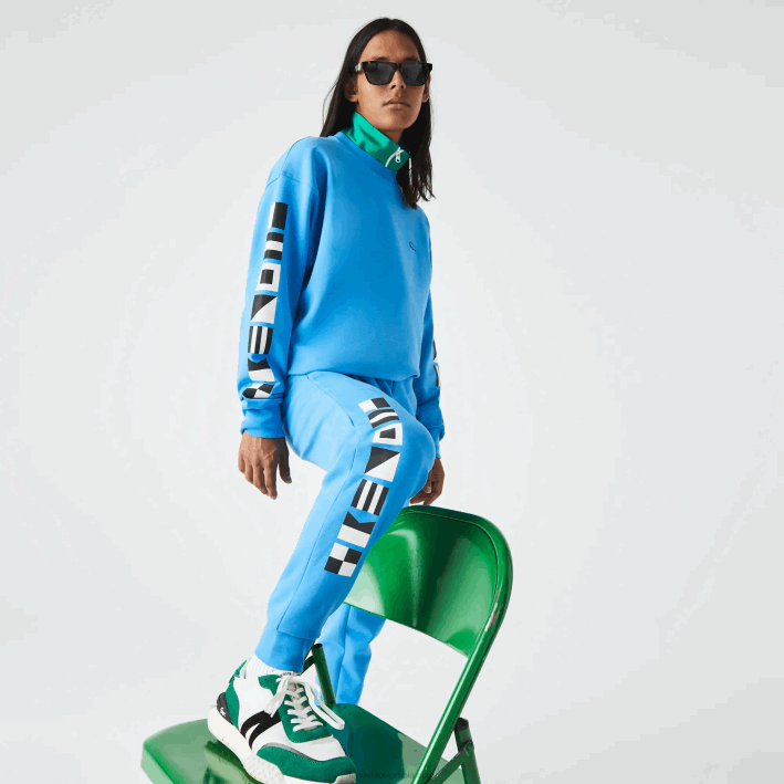 hombres Lacoste 6F241045 azul 4xa pantalones de chándal con estampado reflectante