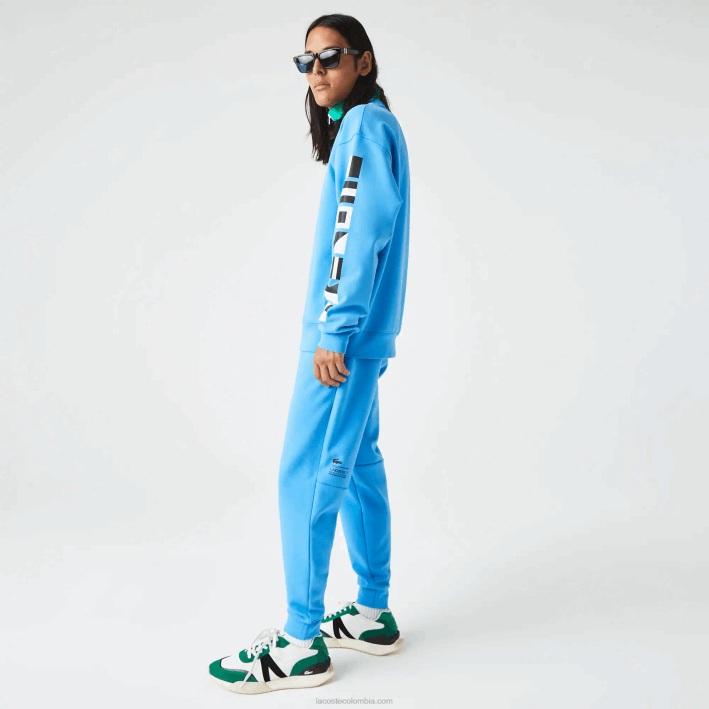 hombres Lacoste 6F241045 azul 4xa pantalones de chándal con estampado reflectante