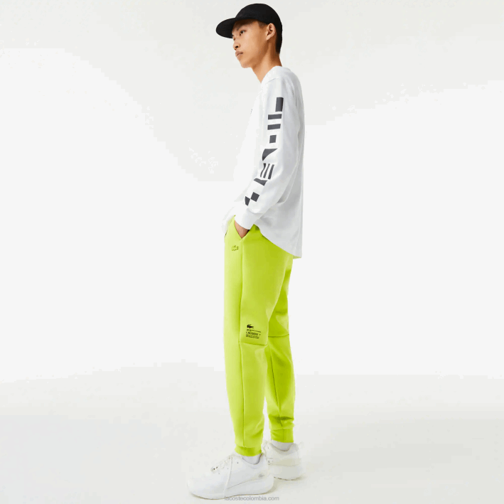 hombres Lacoste 6F241046 amarillo 90v pantalones de chándal con estampado reflectante