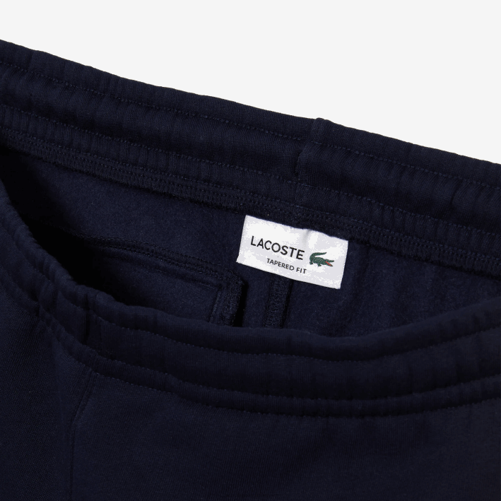 hombres Lacoste 6F241059 azul marino amarillo 144 pantalones de chándal con bandas en contraste