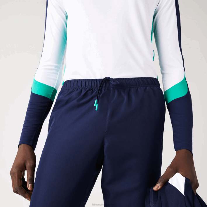 hombres Lacoste 6F241089 azul marino 166 pantalones deportivos de tenis con estampado lateral
