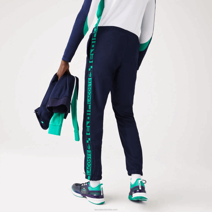 hombres Lacoste 6F241089 azul marino 166 pantalones deportivos de tenis con estampado lateral