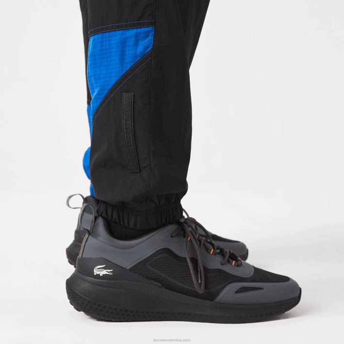 hombres Lacoste 6F241105 negro azul blanco se1 pantalones de chándal repelentes al agua
