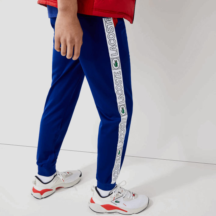 hombres Lacoste 6F241119 azul rojo blanco an3 pantalones deportivos de chándal con bandas de la marca