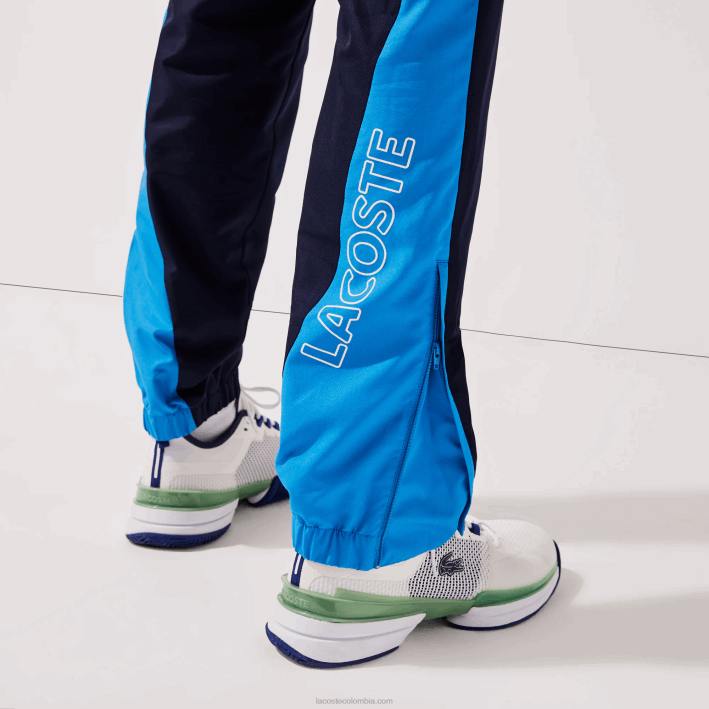 hombres Lacoste 6F241128 verde azul marino blanco m7z pantalones de chándal deportivos con bandas colorblock