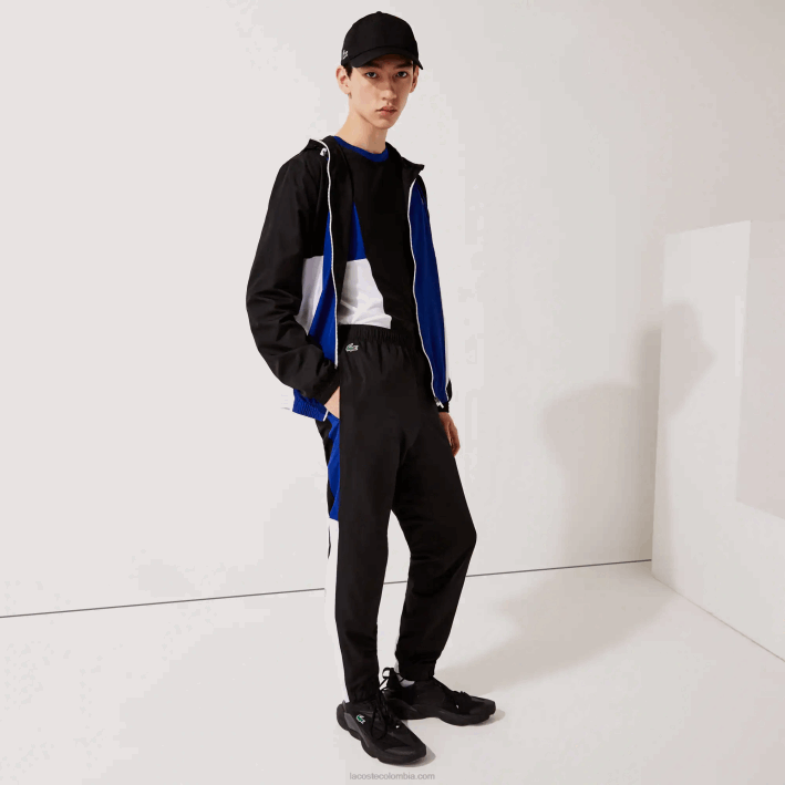 hombres Lacoste 6F241129 negro azul blanco negro aru pantalones de chándal deportivos con bandas colorblock