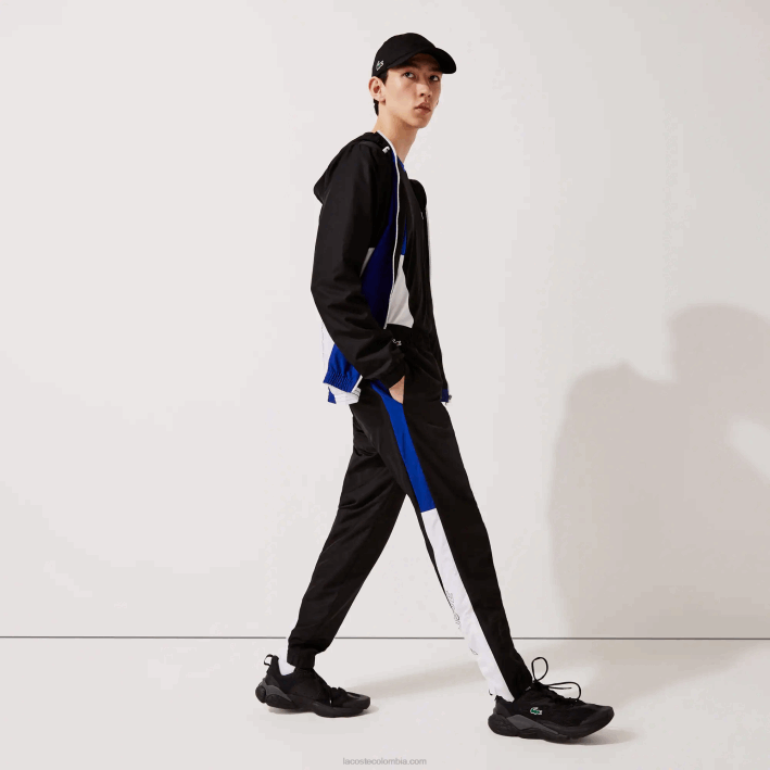 hombres Lacoste 6F241129 negro azul blanco negro aru pantalones de chándal deportivos con bandas colorblock