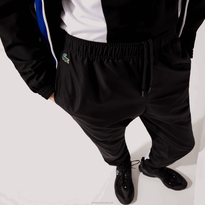 hombres Lacoste 6F241129 negro azul blanco negro aru pantalones de chándal deportivos con bandas colorblock