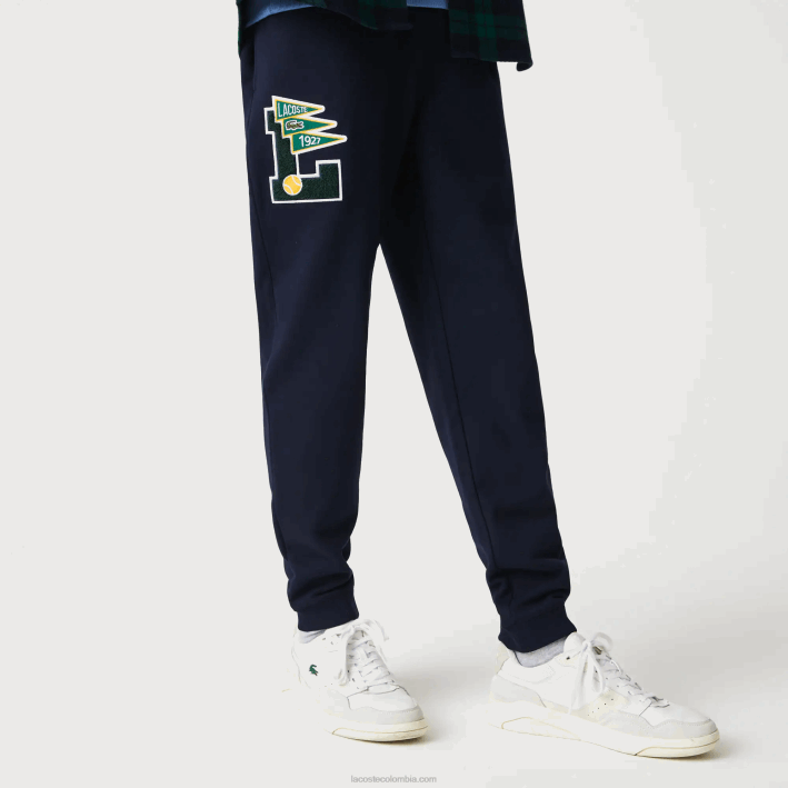 hombres Lacoste 6F241168 azul marino 166 pantalones de chándal de forro polar con insignia de banderines l