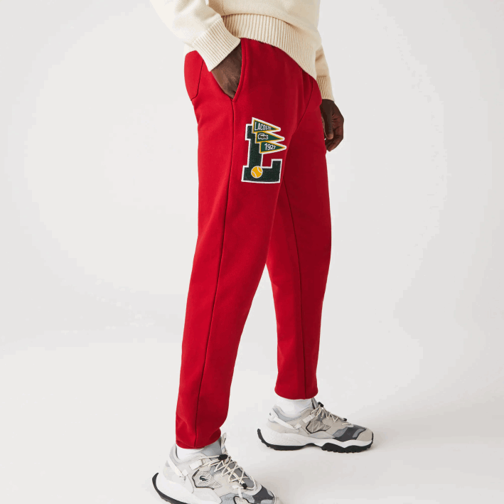 hombres Lacoste 6F241170 rojo 5sx pantalones de chándal de forro polar con insignia de banderines l