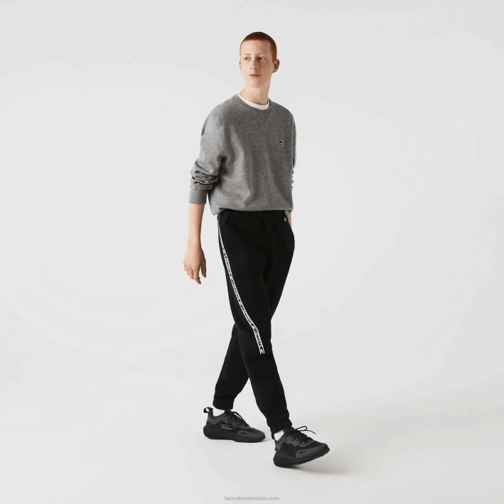 hombres Lacoste 6F241459 negro 031 pantalones de chándal con bandas estampadas