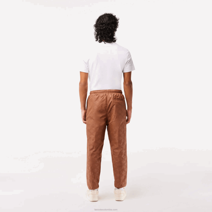 hombres Lacoste 6F24317 lfa marrón claro pants con monograma estampado
