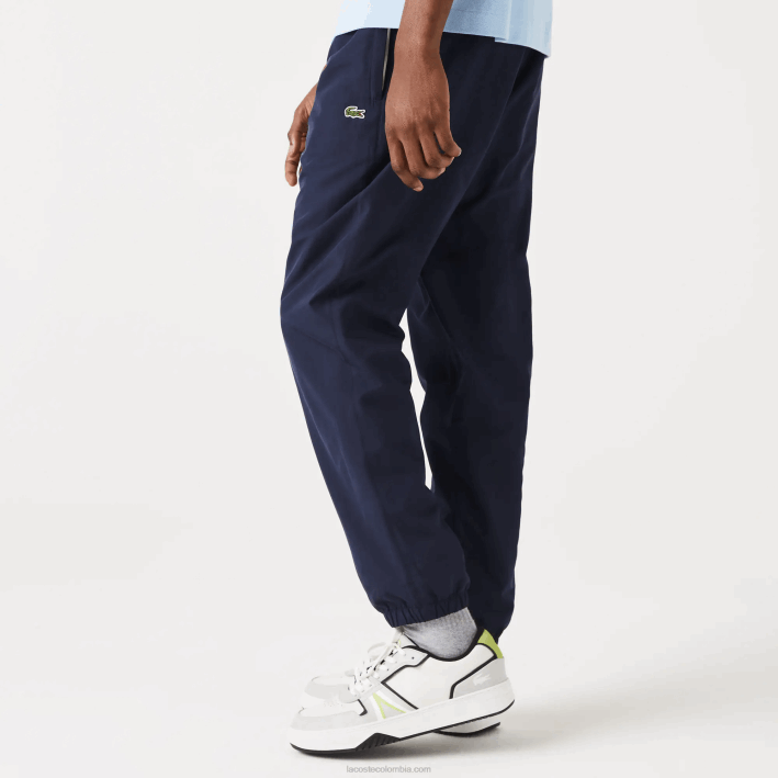 hombres Lacoste 6F24332 azul marino 166 pantalones de chándal repelentes al agua regular fit