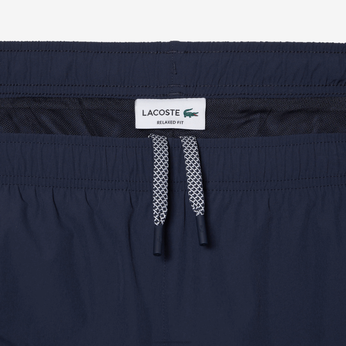 hombres Lacoste 6F24336 kxe azul pantalones de chándal elásticos e impermeables