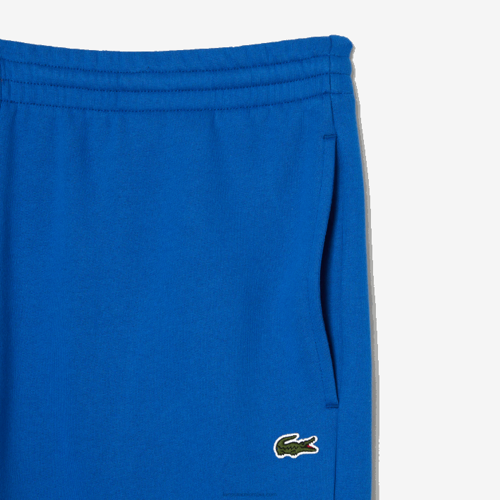 hombres Lacoste 6F24357 kxb azul pantalones de chándal tapered fit