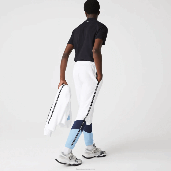 hombres Lacoste 6F241146 blanco azul vhe pantalones de chándal de vellón con bloques de color a rayas de la firma