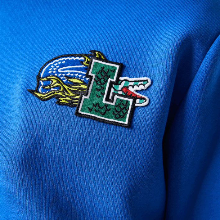 hombres Lacoste 6F241134 azul k1q sudadera con capucha y estampado de cómic